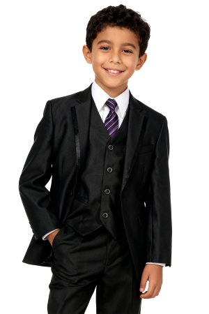 a boy wearing a black suit with a semi-shiny black fabric with a trim around the lapel