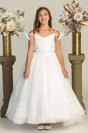 white communion dress with bows and a train