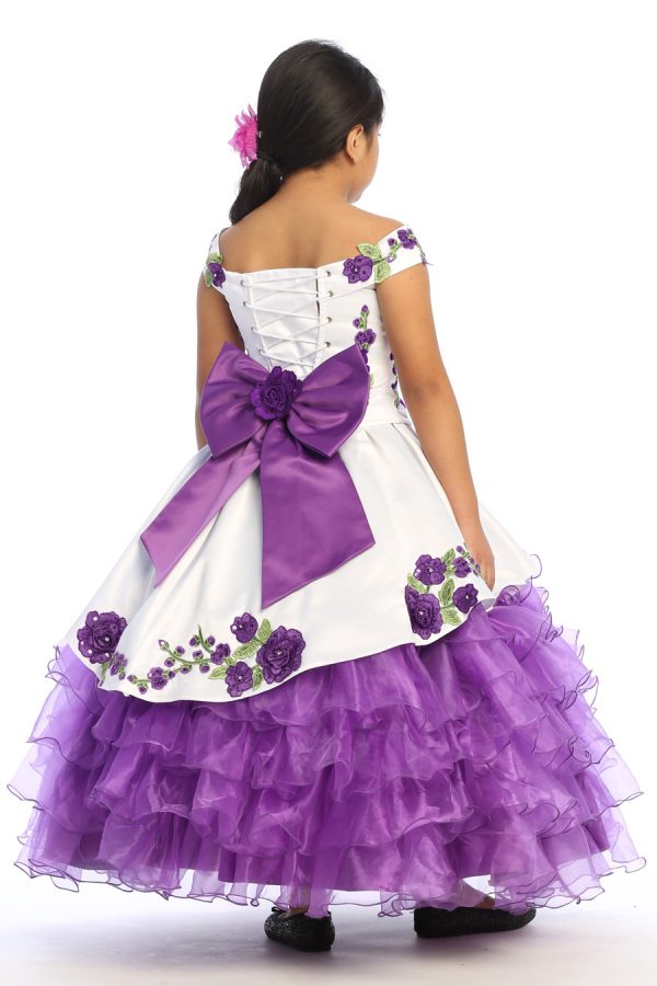 Purple and white charra dress with embroidered appliques and a large removable bow.