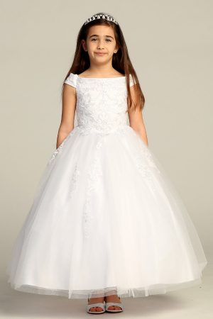 An all white tea length dress for girls. Simple yet elegant and with a slight glitter shine. Drop down shoulders and embroidered bodice, with slight glitter shine in the bottom skirt.