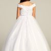 All white tea length dress for girls. Simple yet elegant and with a slight glitter shine. Corset closure with embroidered bodice. length above the ankle