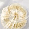 the bonnet is expandable to make sure it fits the child's head.
