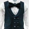 boy's dark teal vest combined with navy blue over a white long sleeve dress shirt