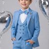 a boy wearing a light blue suit with a jacket, lapeled vest, white shirt, matching bow-tie, pants,