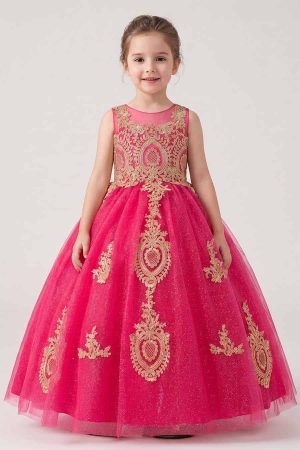 Girls fuchsia ball gown with gold embroidered appliqués, glitter tulle skirt, keyhole back, and lace-up corset closure shown from front